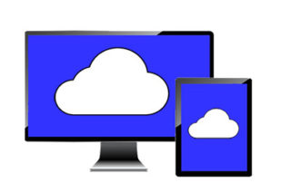 desktop computer and device with blue background and cloud
